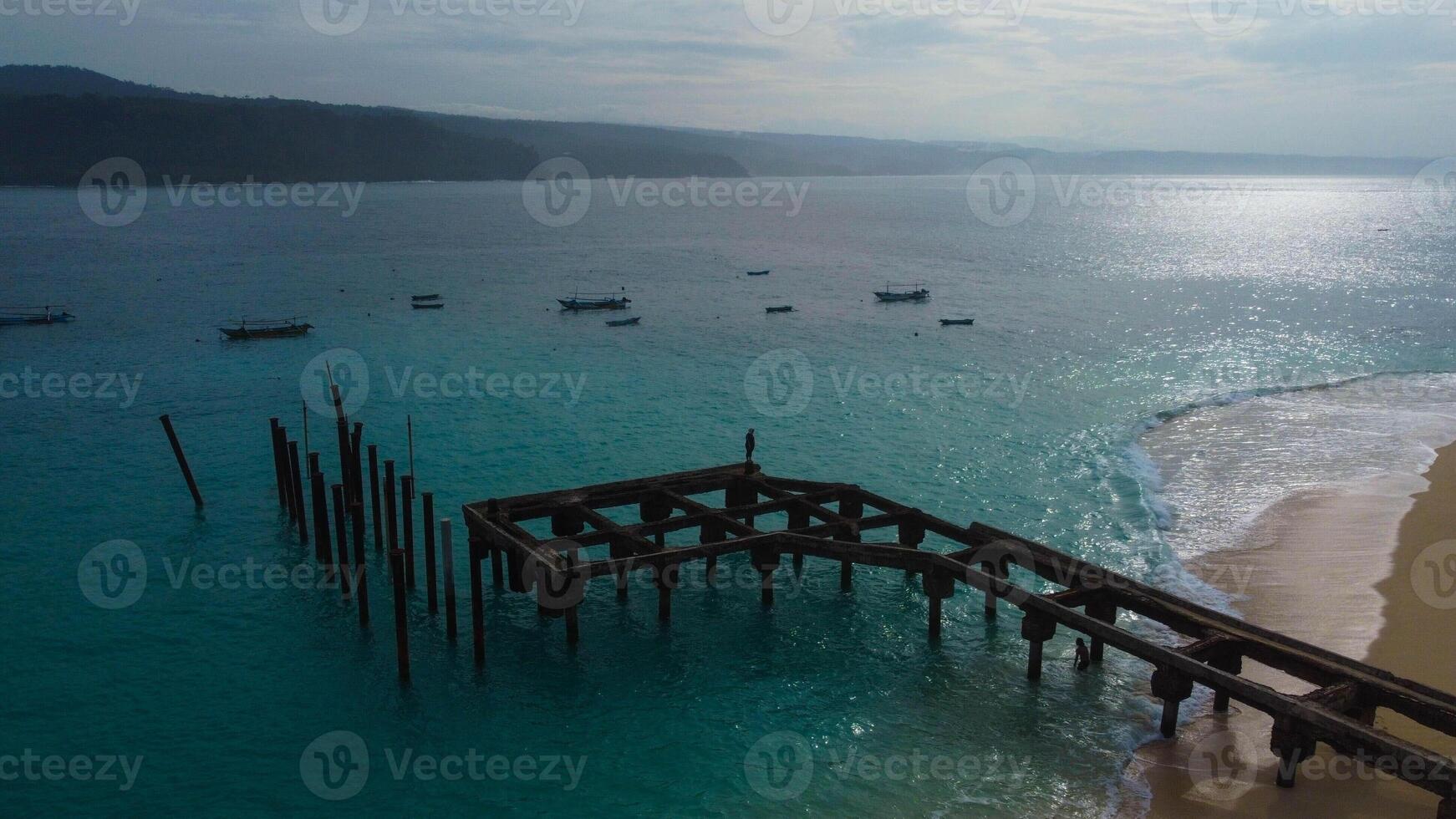 Beautiful panoramic aerial view from drone of sea bay, waves crashing on the harbor in Indonesia Mediterranean landscape, rotation, photo
