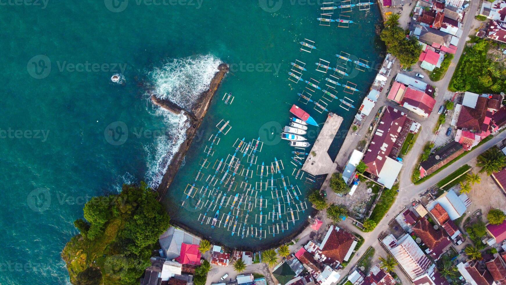 Aerial view of amazing boats. Marina bay. Top view from drone of harbor with yacht, motorboat and sailboat. Seascape photo