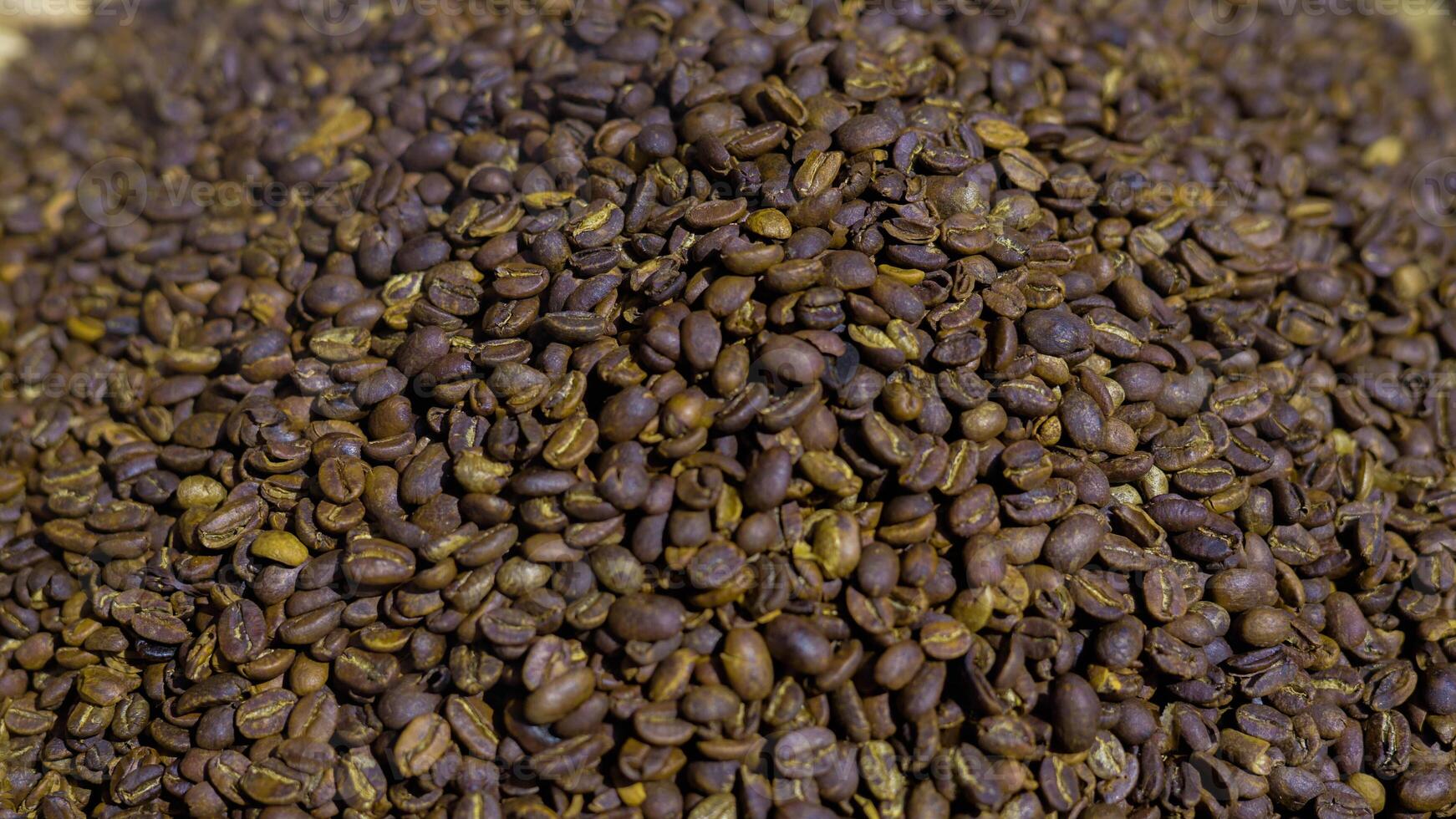 Bajawa's traditional coffee roasting process, showcasing rich beans being expertly roasted, capturing the essence of local culture and flavor. photo