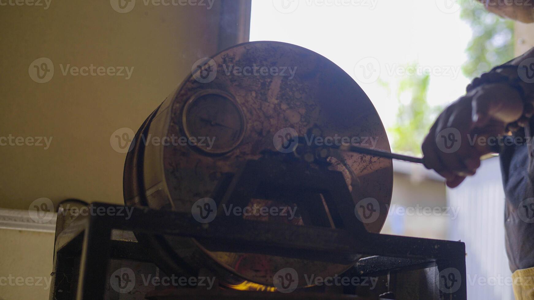 Bajawa's traditional coffee roasting process, showcasing rich beans being expertly roasted, capturing the essence of local culture and flavor. photo