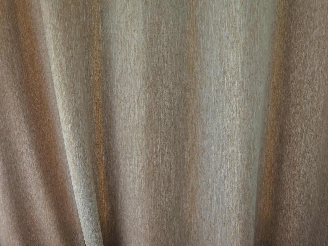 brown curtain for covering the window. for background and textured. photo