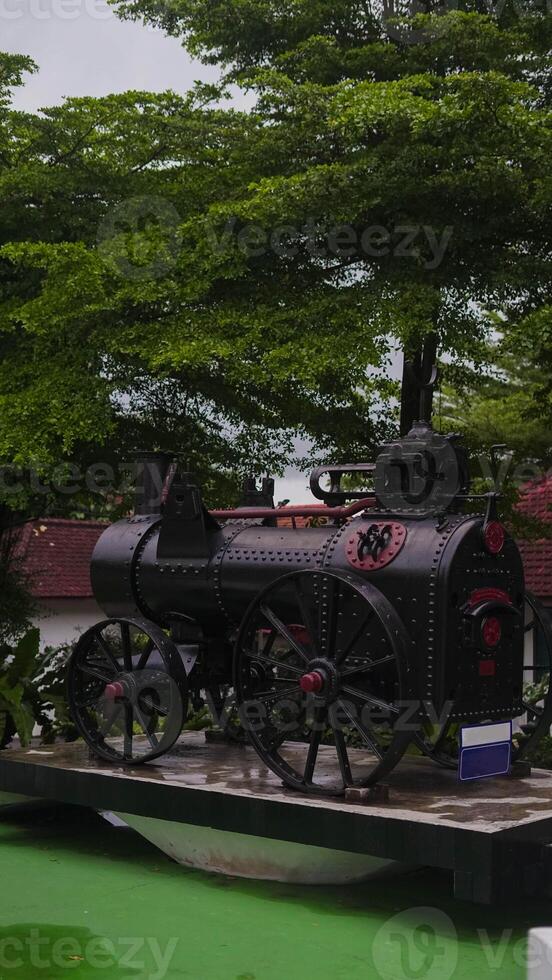 Locomotive used for transporting tin mining products left by the Dutch in Indonesia photo