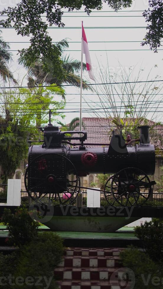 Locomotive used for transporting tin mining products left by the Dutch in Indonesia photo