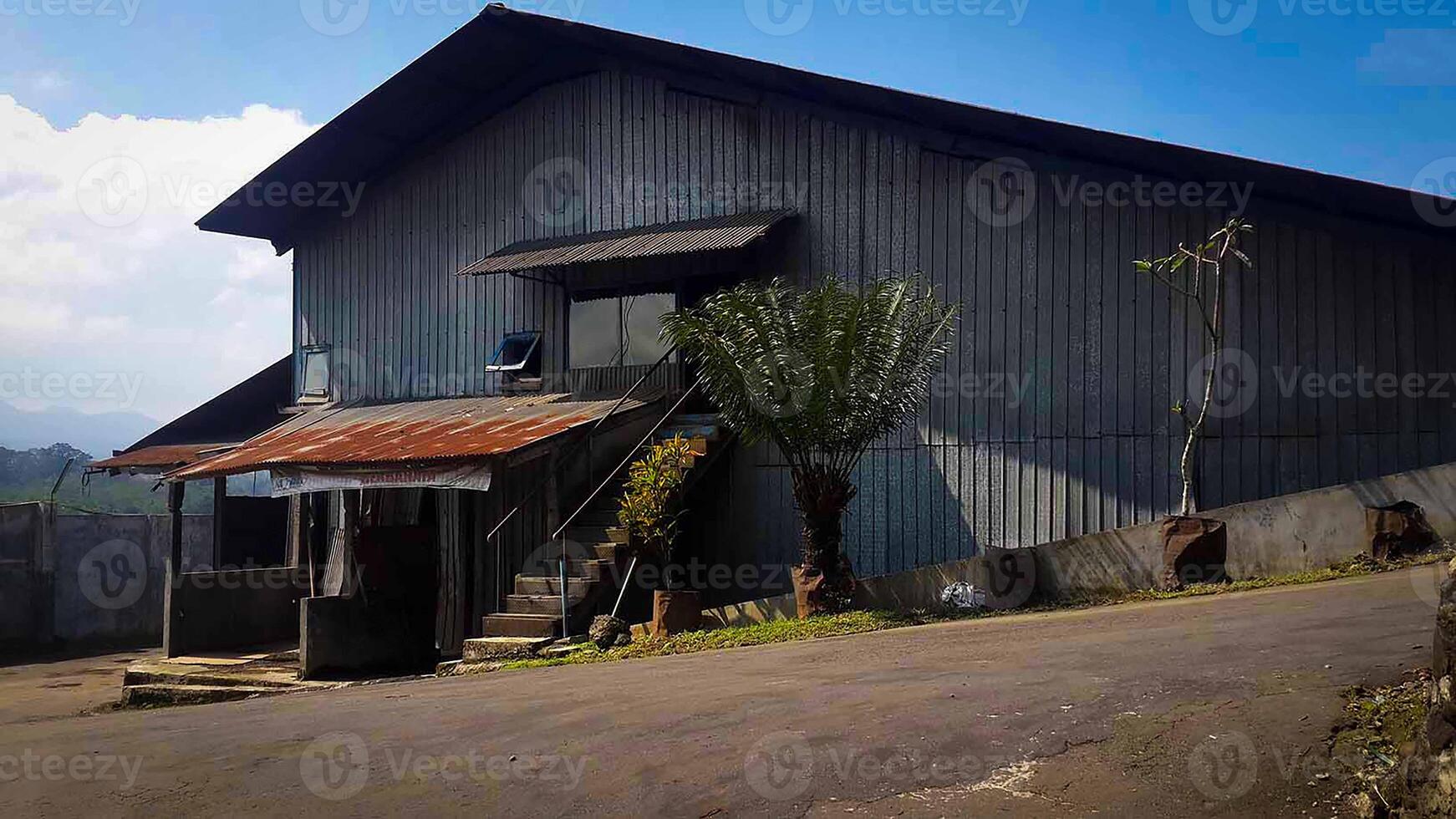 Decommissioned wood working plant and manufacturing, rusty and dilapidated factory due to disposal tools and machinery photo