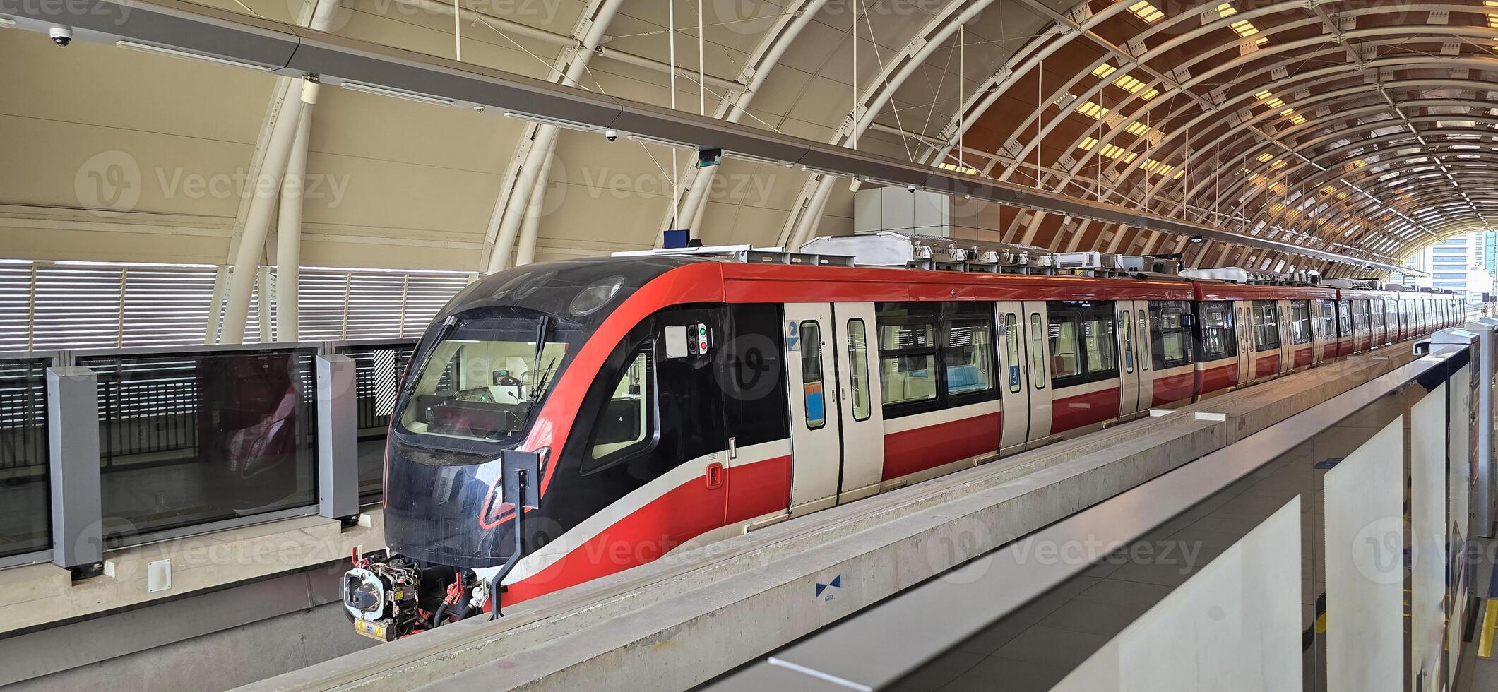Light Rail Transit or LRT or rail transport system in Indonesia, modern metro train stationed at an urban platform, showcasing efficient public transport photo
