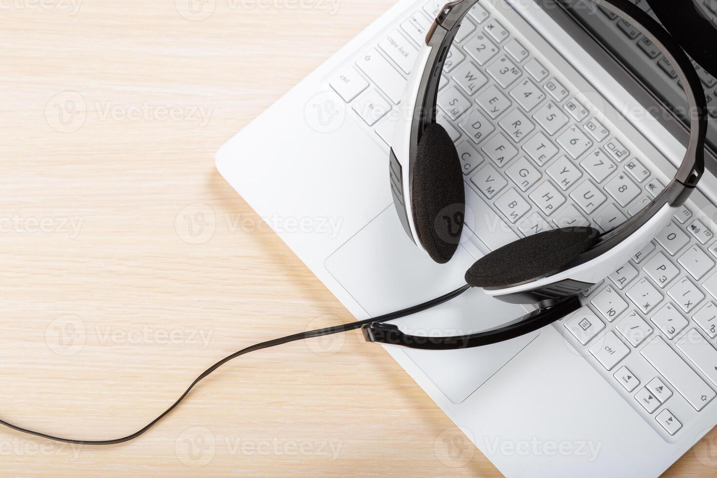 headset on keyboard computer laptop photo