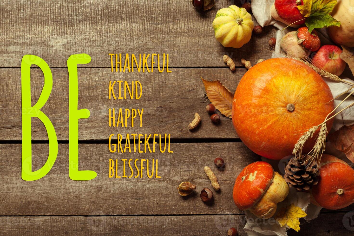 Happy thanksgiving day display on wooden background photo