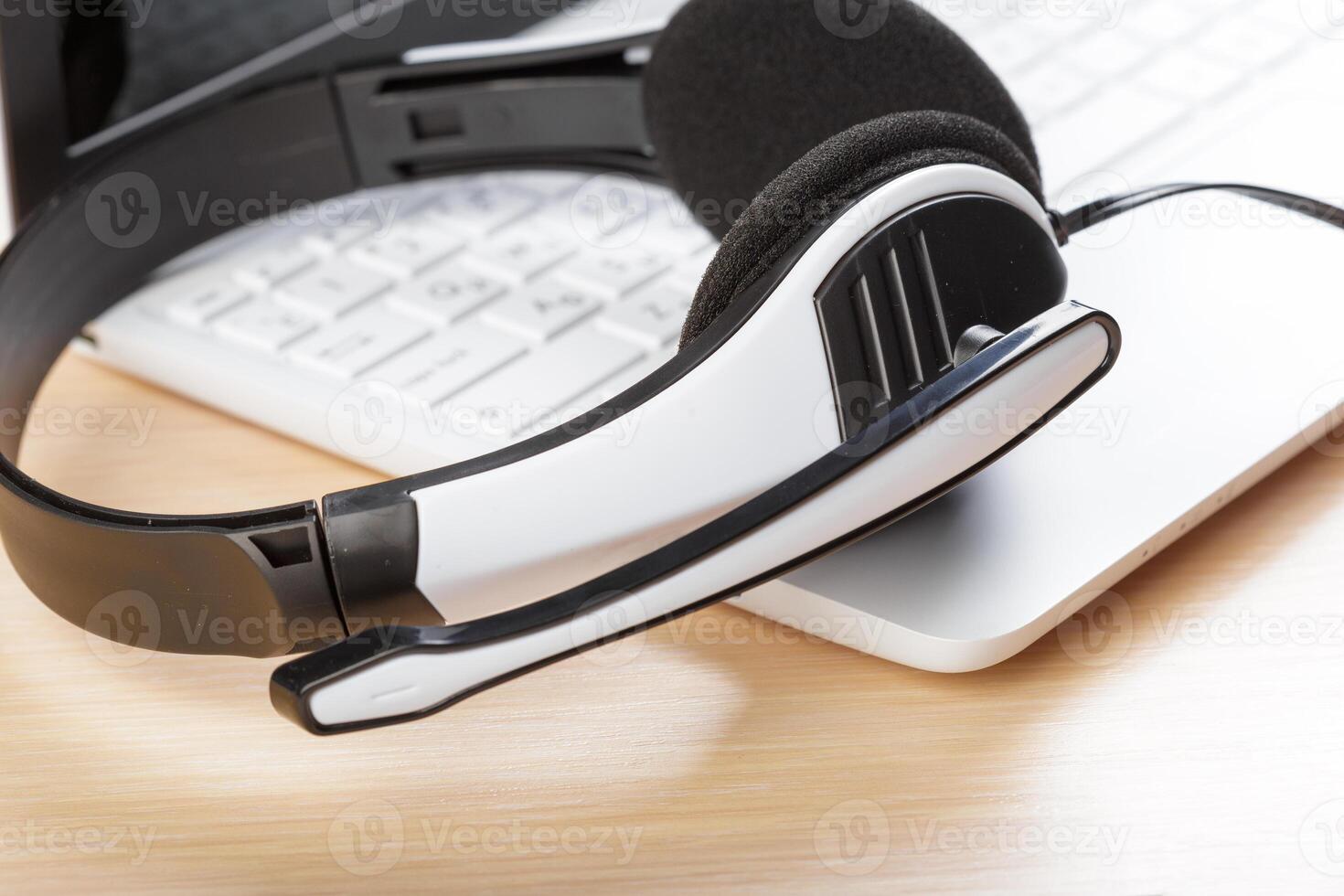 headset on keyboard computer laptop photo