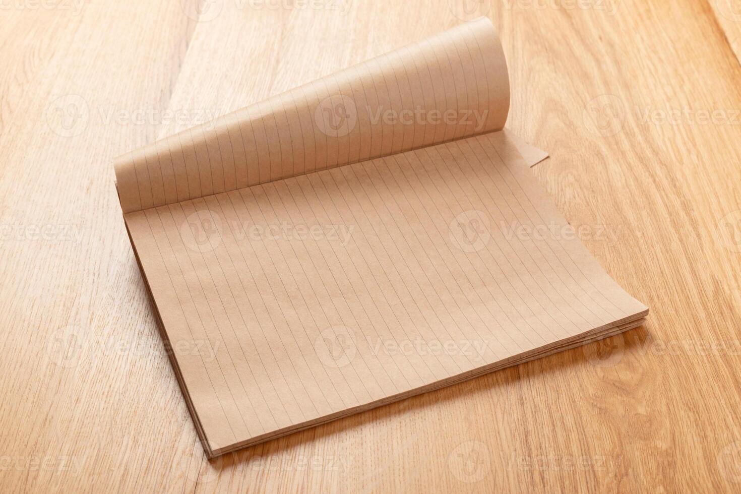 Blank notebook on the table photo