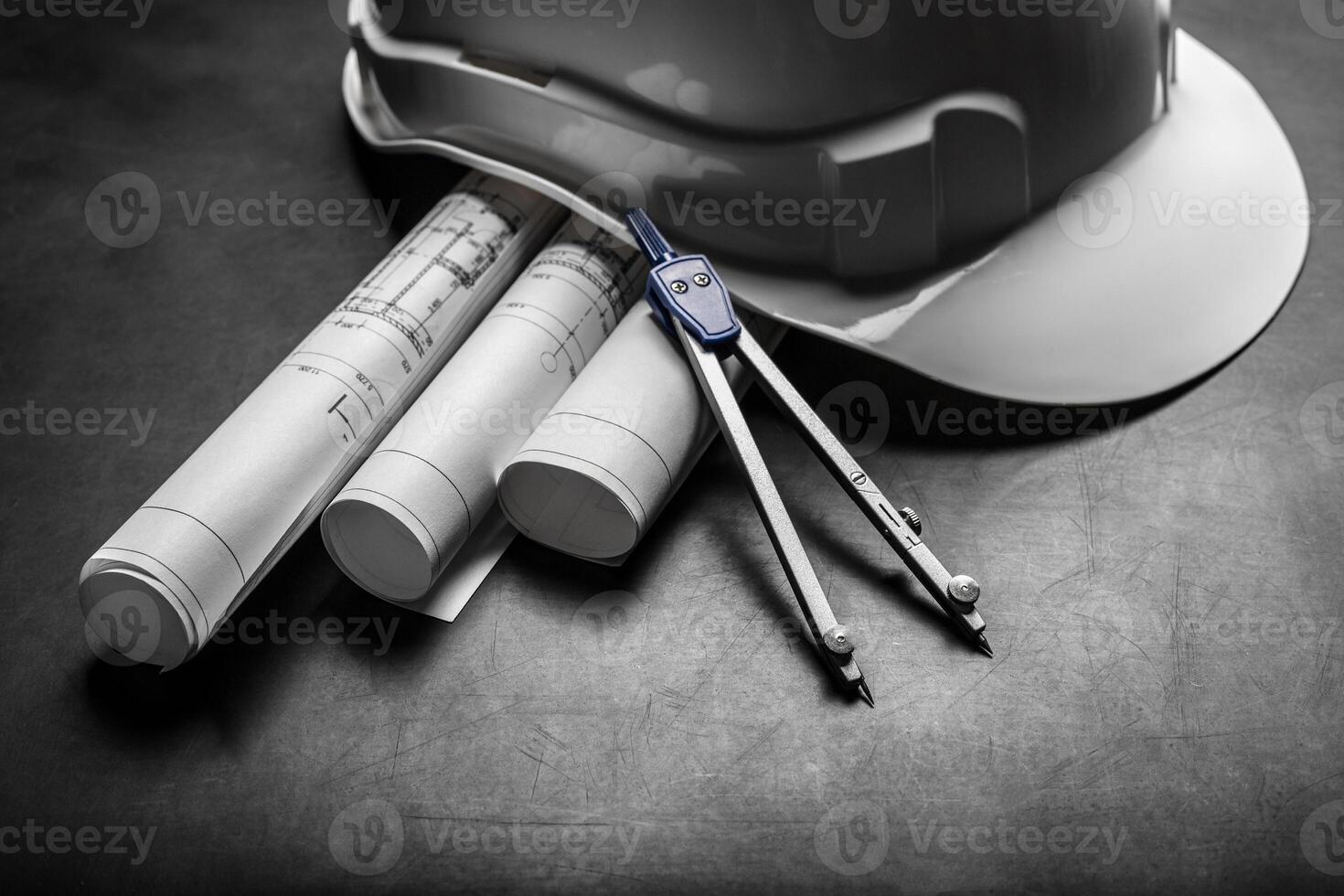 Construction planning drawings on black background photo