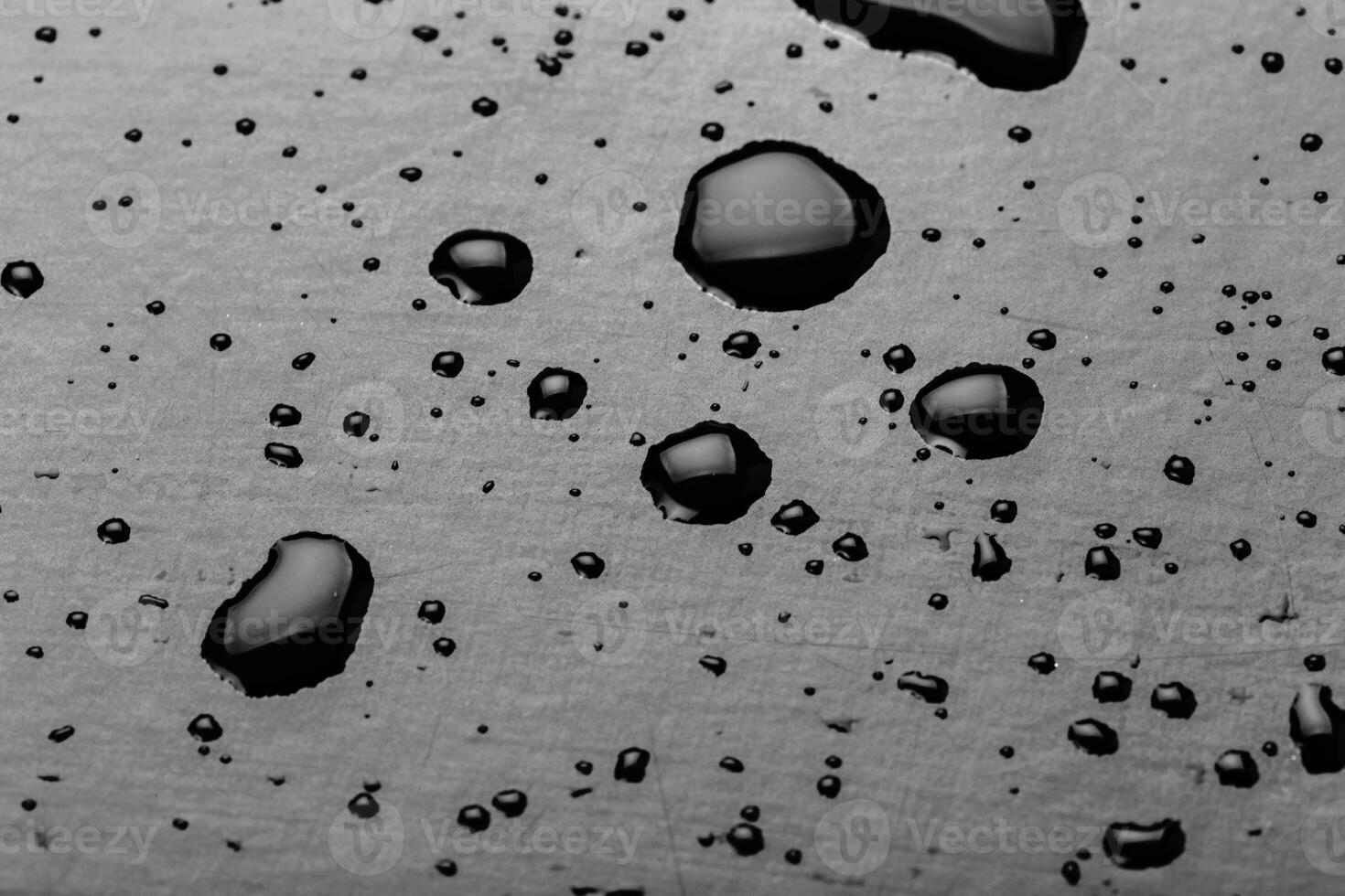 water drops splash on the black floor photo