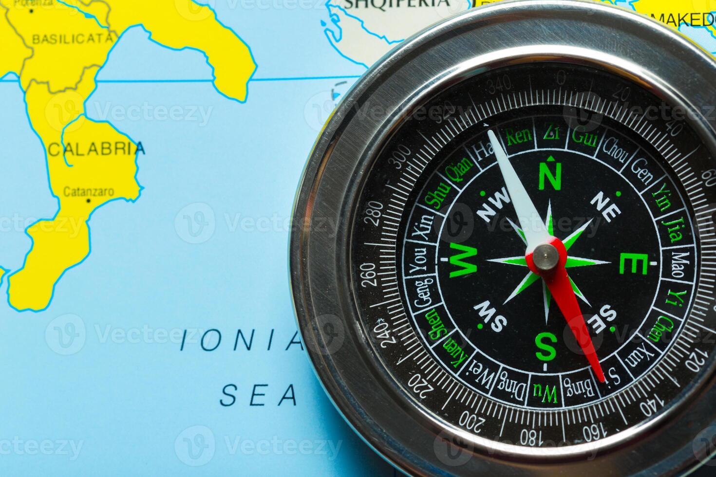 compass on map background travel photo