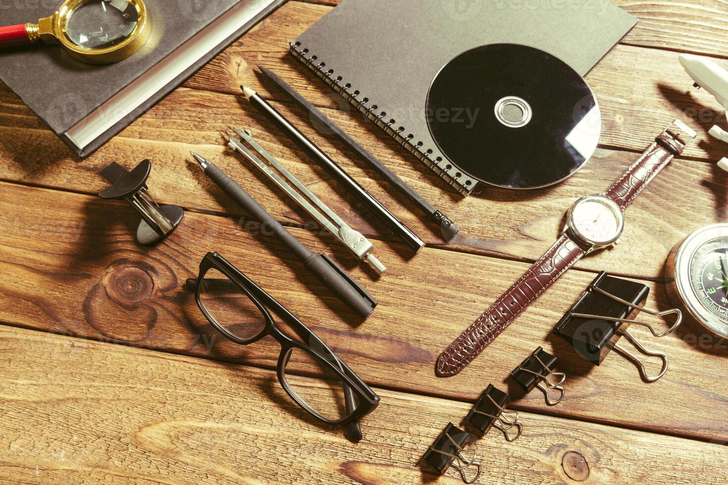 wooden desk with office tools photo