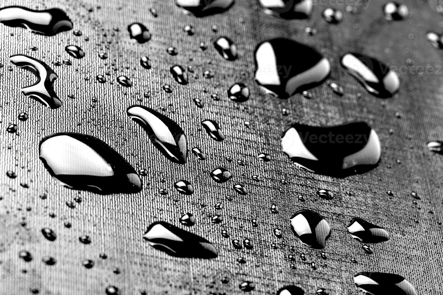 water drops splash on the black floor photo