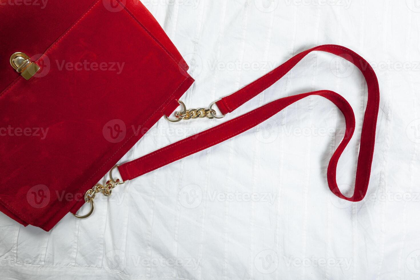 Female bag on white textile photo