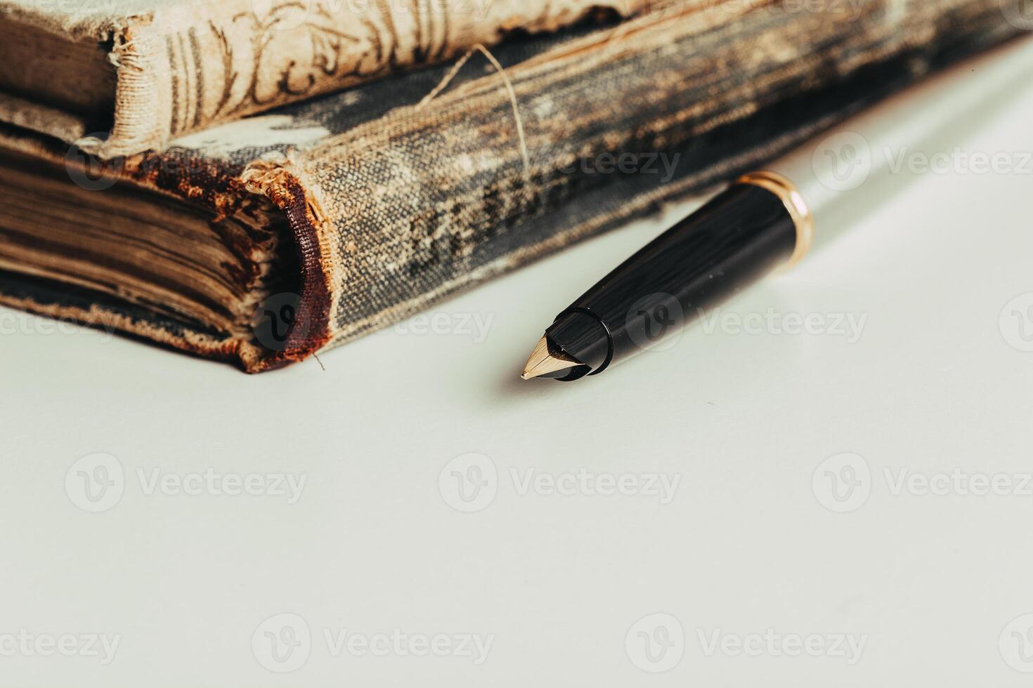 Fountain pen on open notepad photo