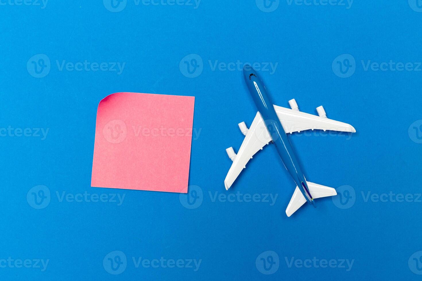 model of passenger plane on blue background photo