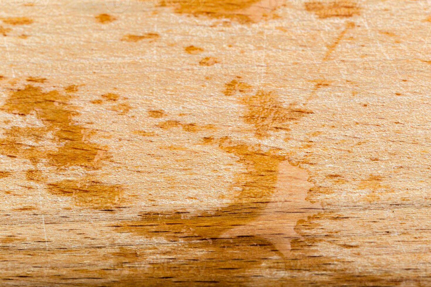 Drop of water on wooden table photo
