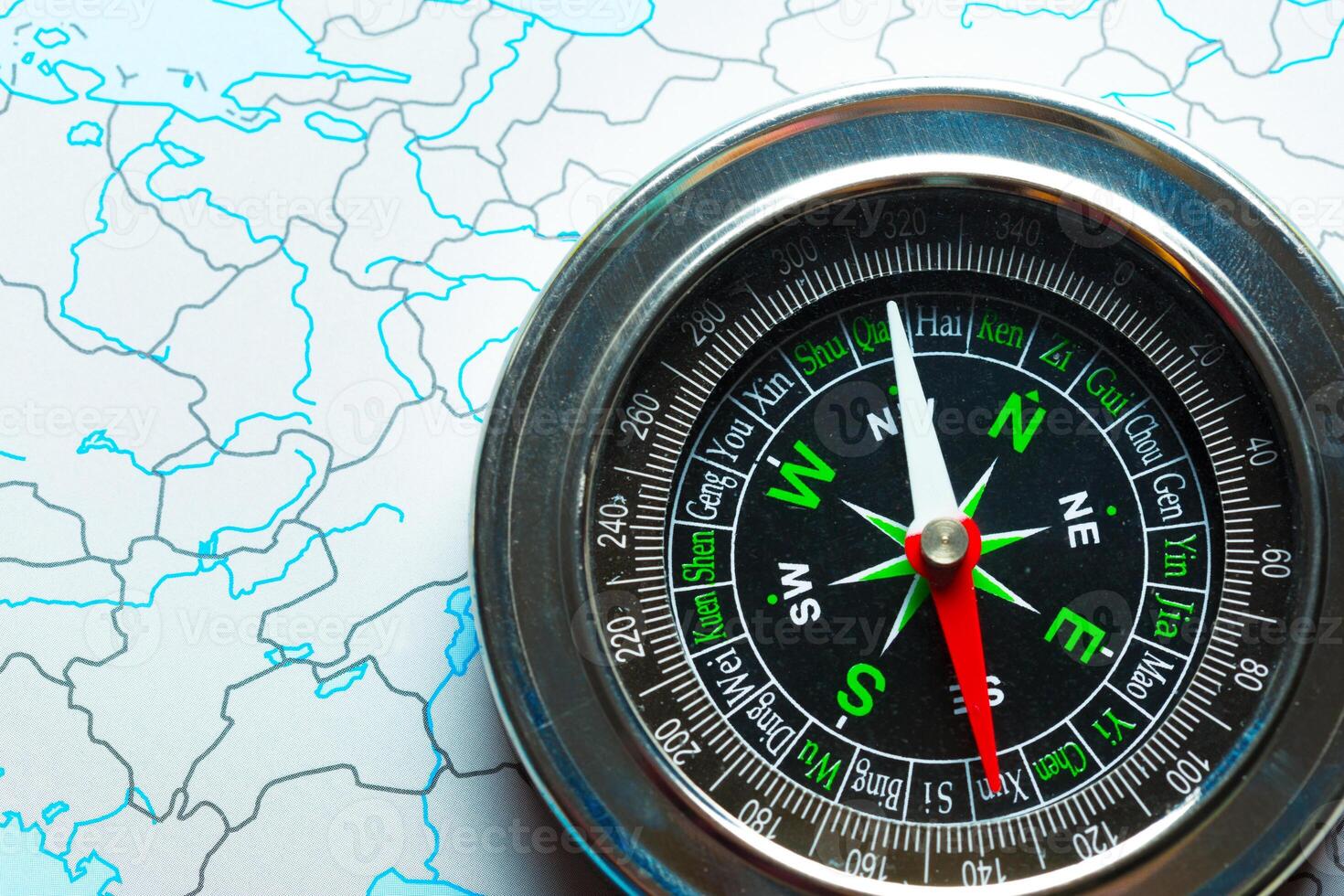 compass on map background travel photo