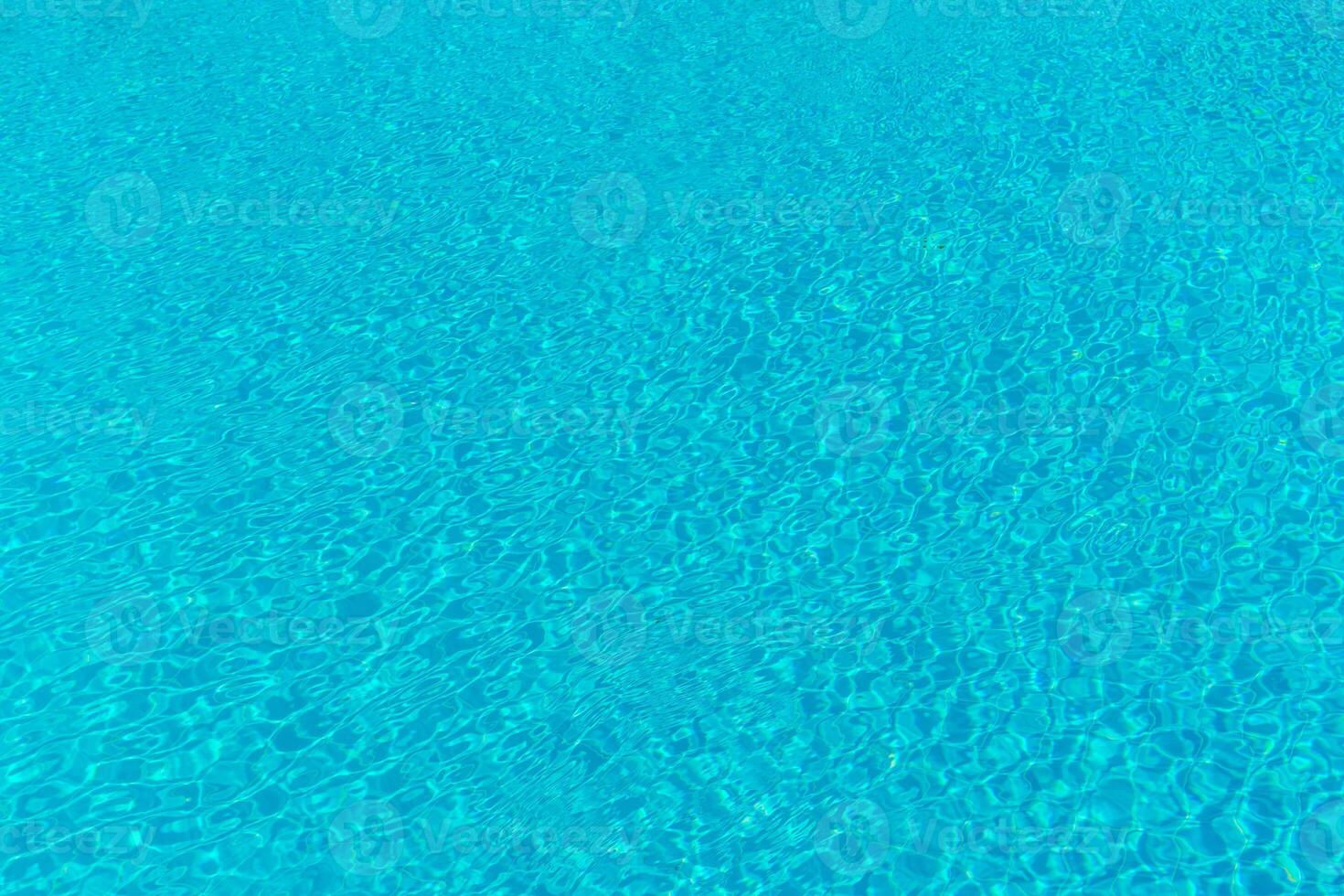 The smooth water in the pool as a background photo