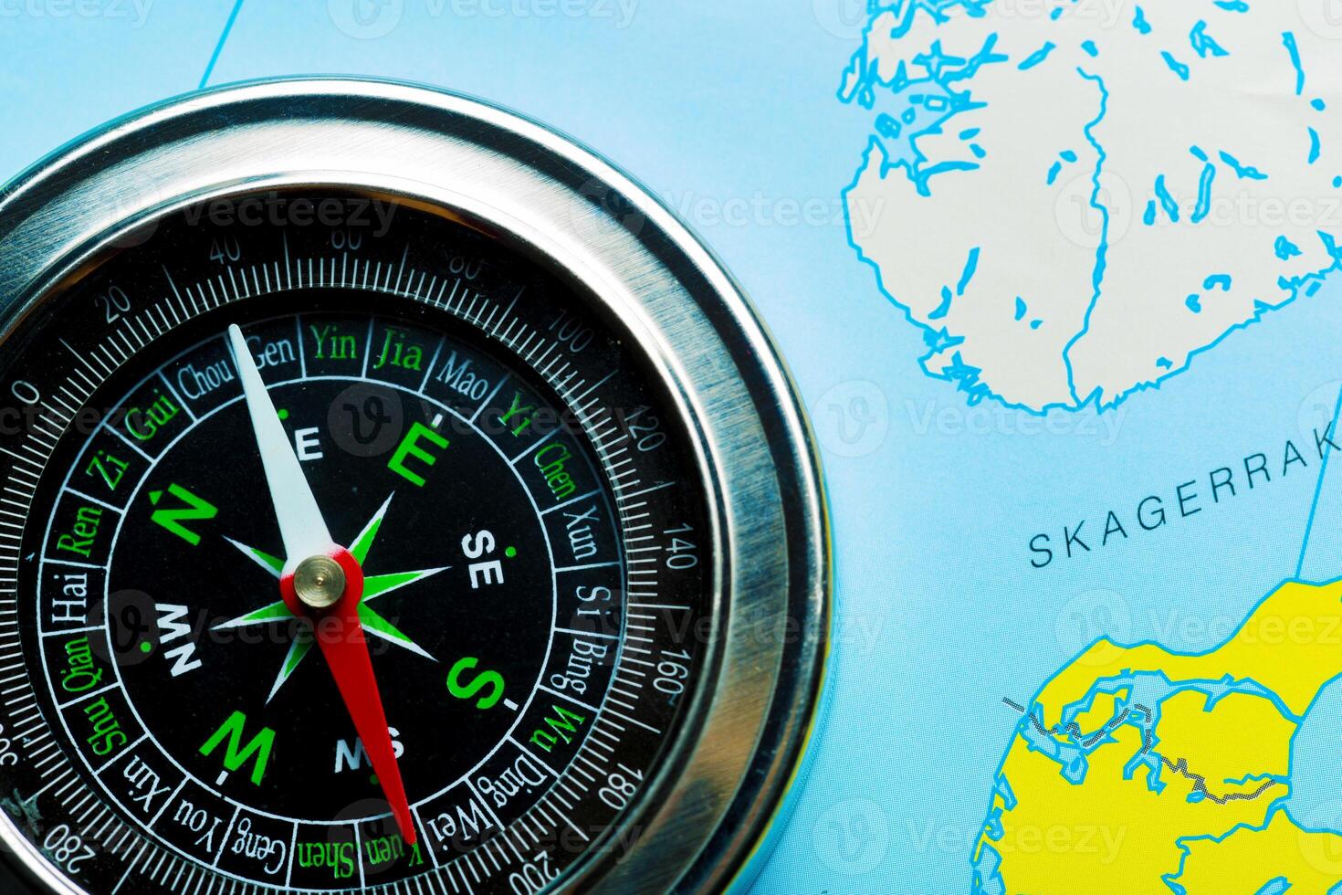 compass on map background travel photo