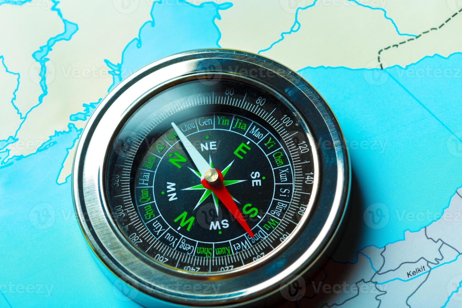compass on map background travel photo