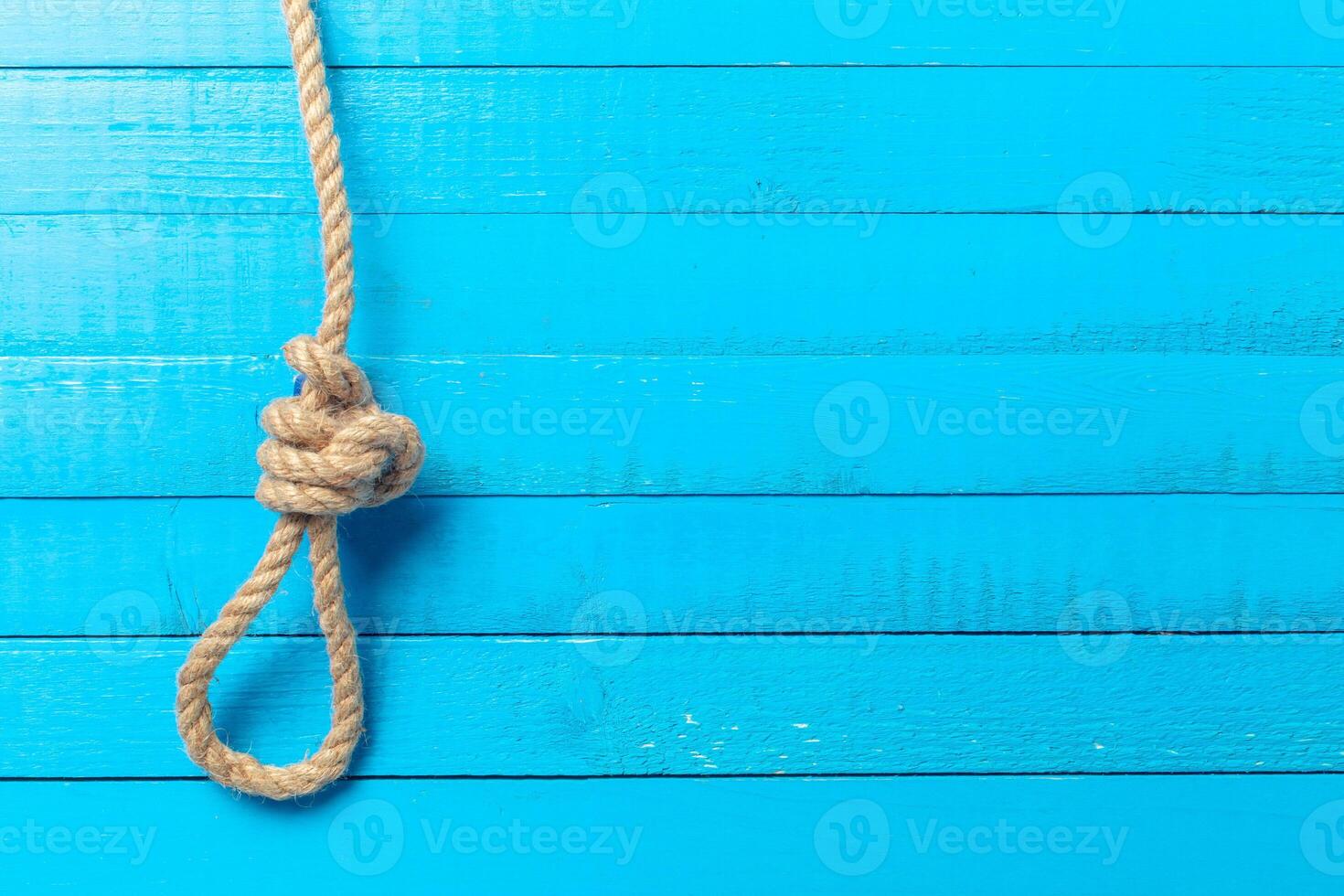 ship rope on wooden background photo