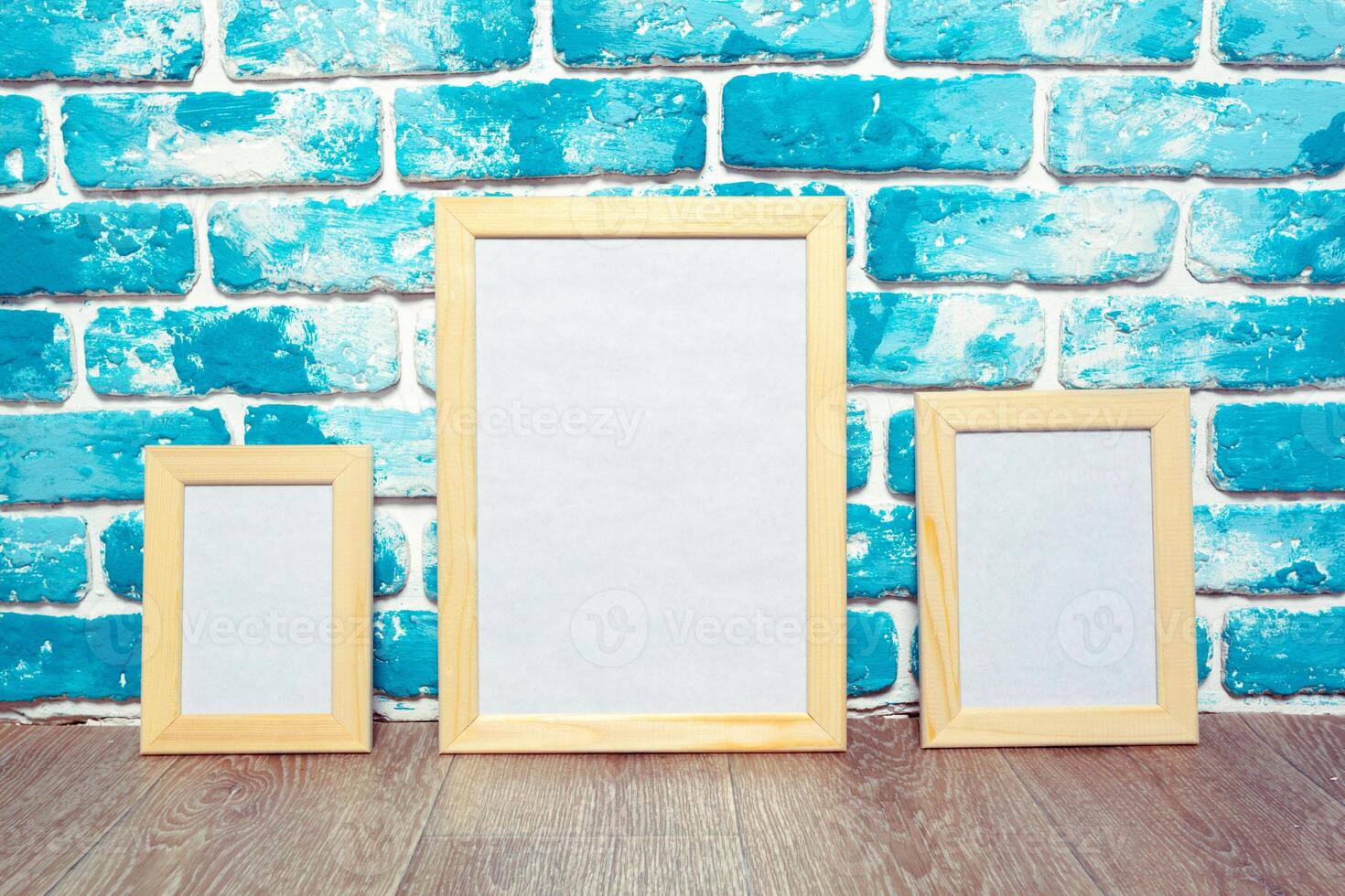 Picture frame on brick wall photo