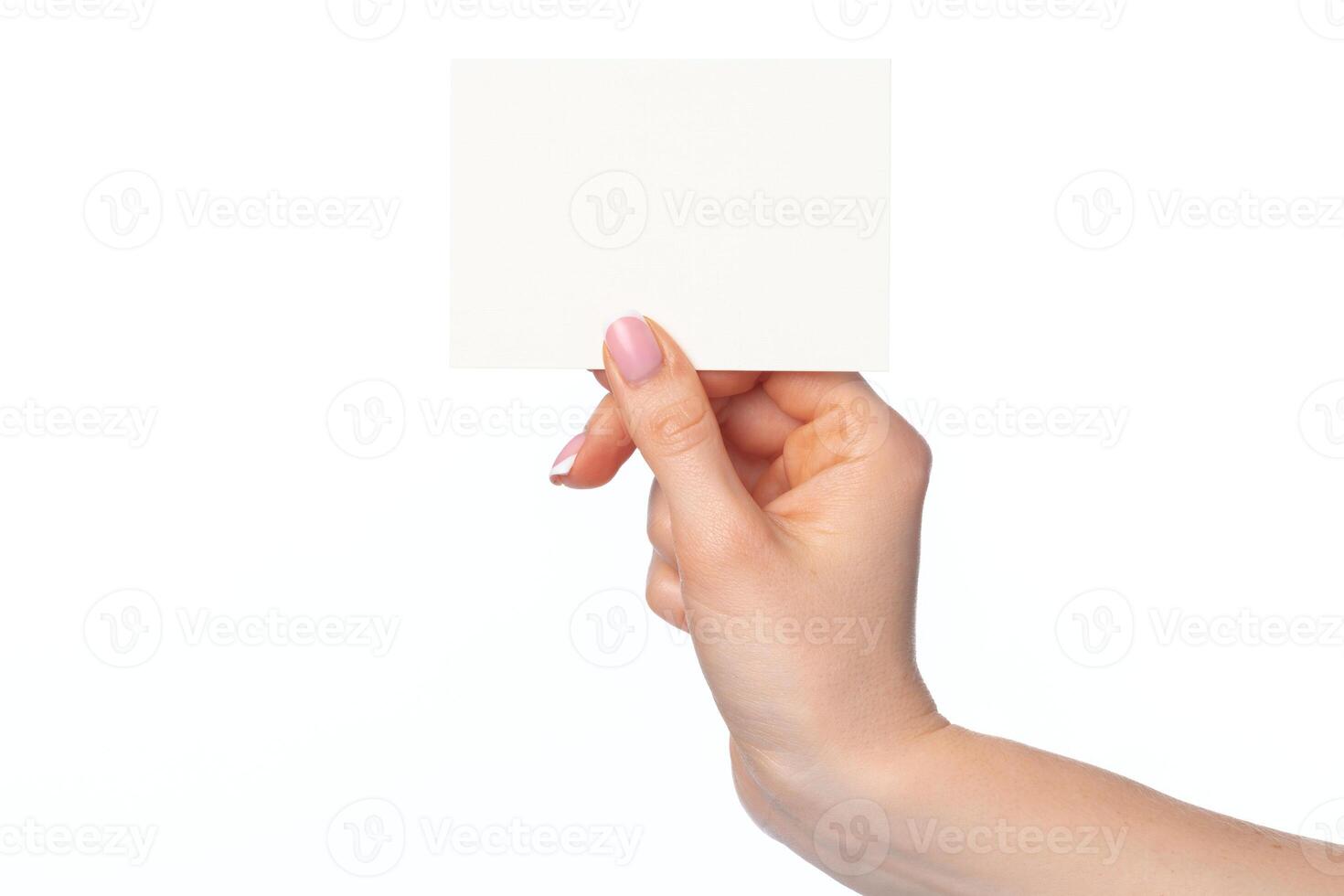 Woman's hand with blank white business card isolated on white photo