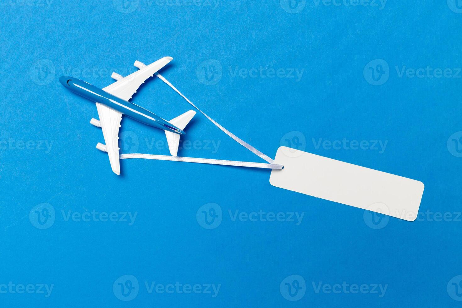 model of passenger plane on blue background photo