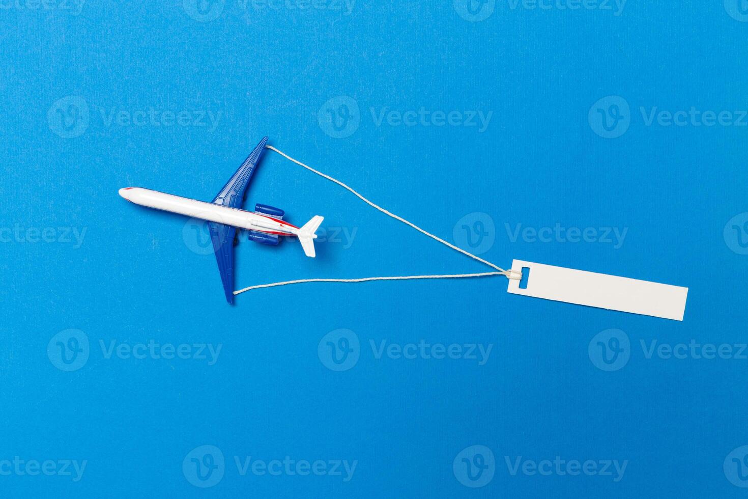 model of passenger plane on blue background photo