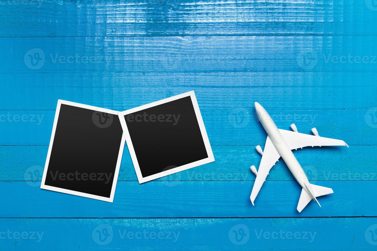 model of passenger plane on blue background photo