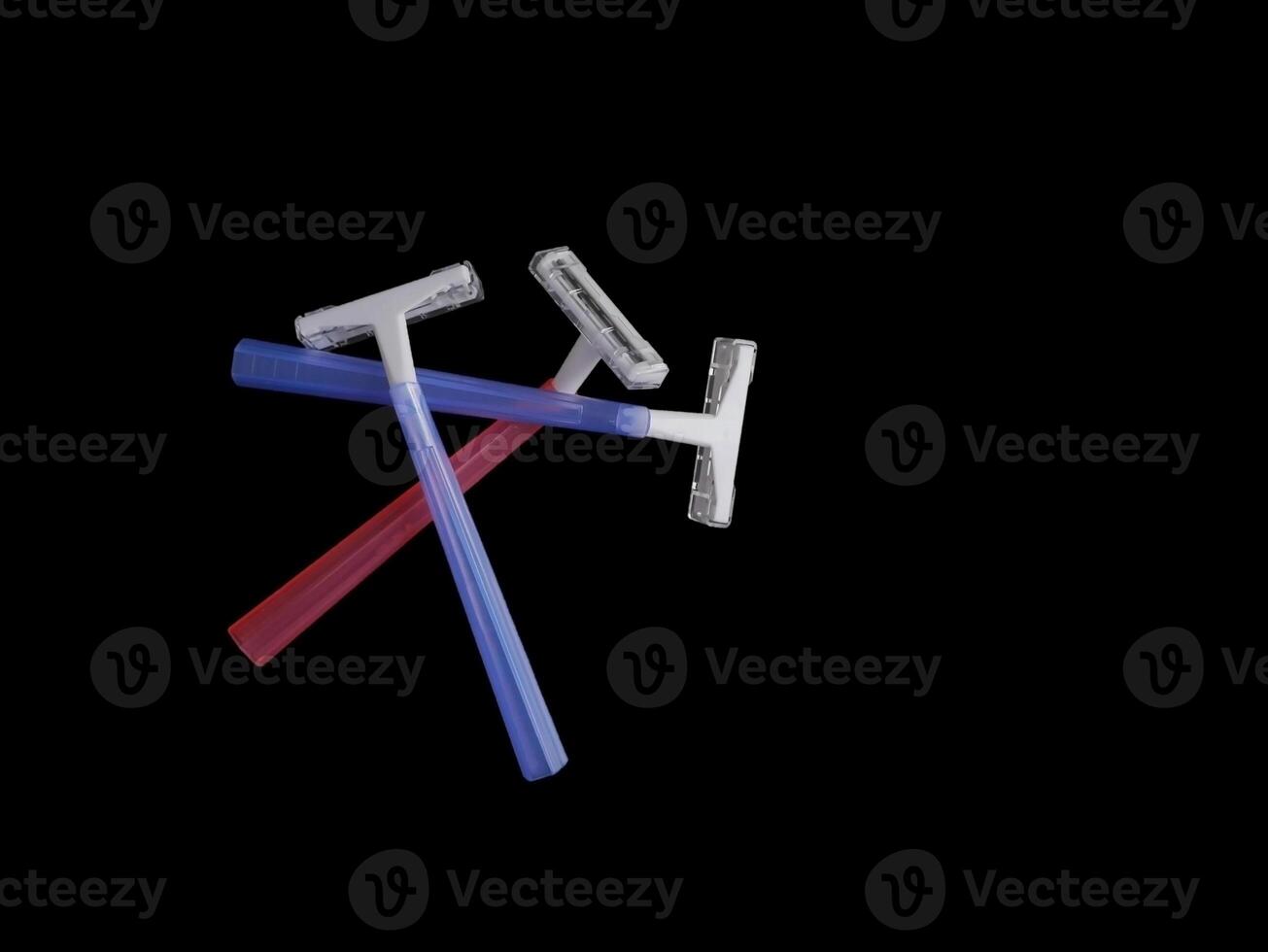 Razors for removing body hair isolated on black background with copy space photo