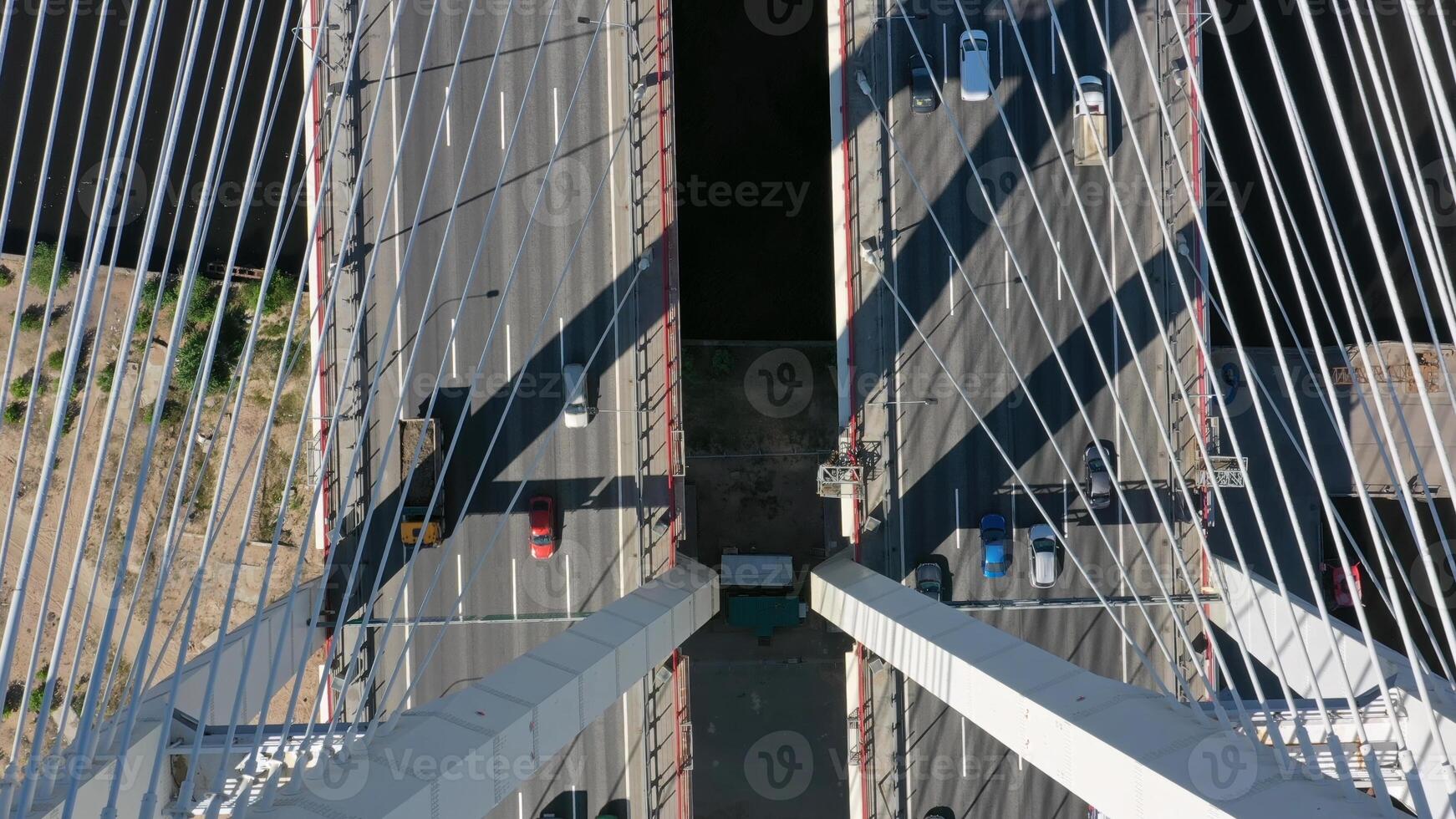 Cable-stayed bridge with cars photo