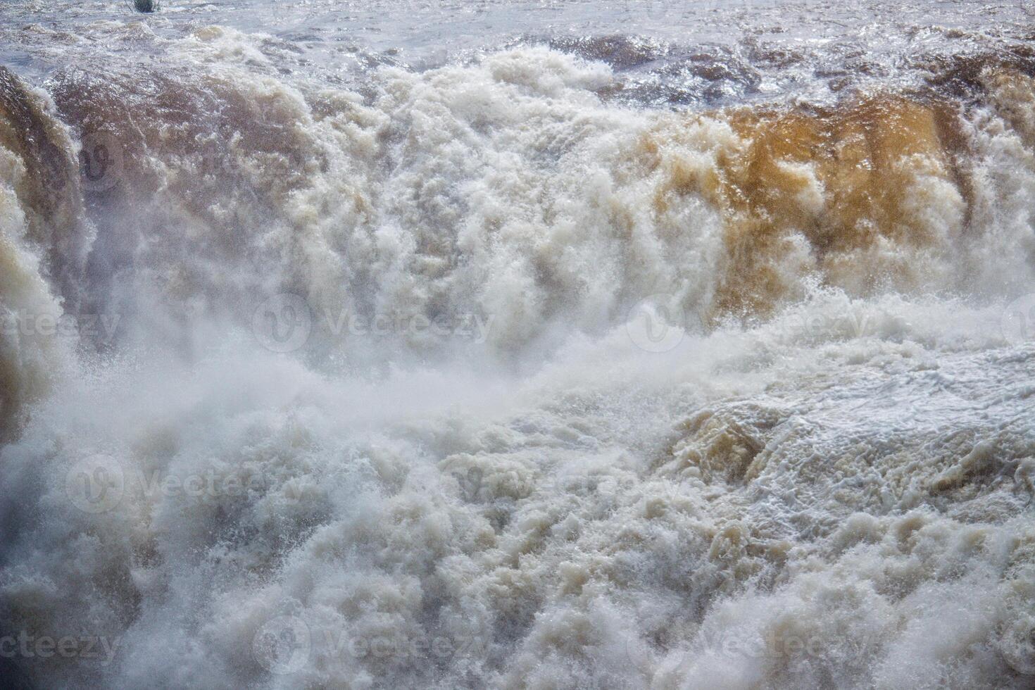 Close-up of the force of the water at Iguazu Falls, Misiones, Argentina photo
