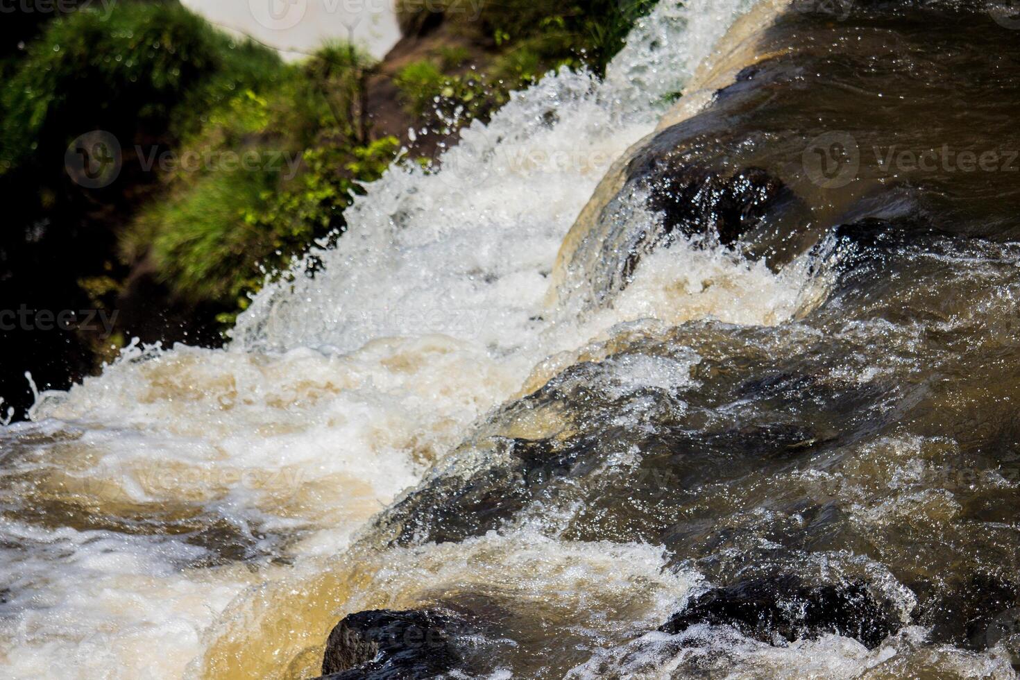 Top view of rocks and waterfalls of Iguazu Falls, Misiones, Argentina photo