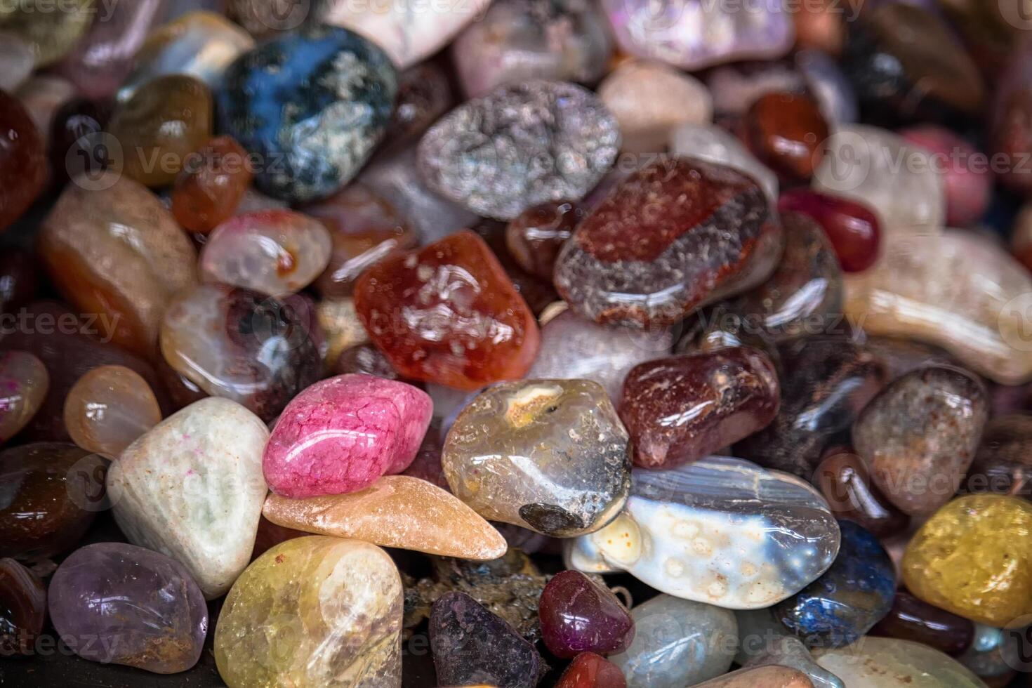 close-up of various stones of different sizes and colors photo