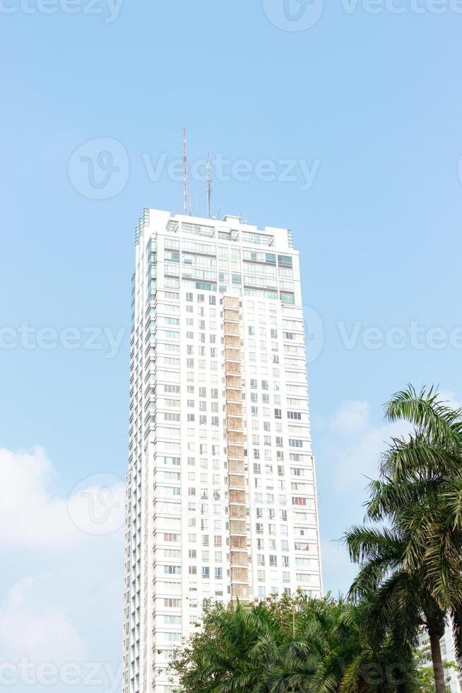 High rise building with blue sky background. After edits. photo
