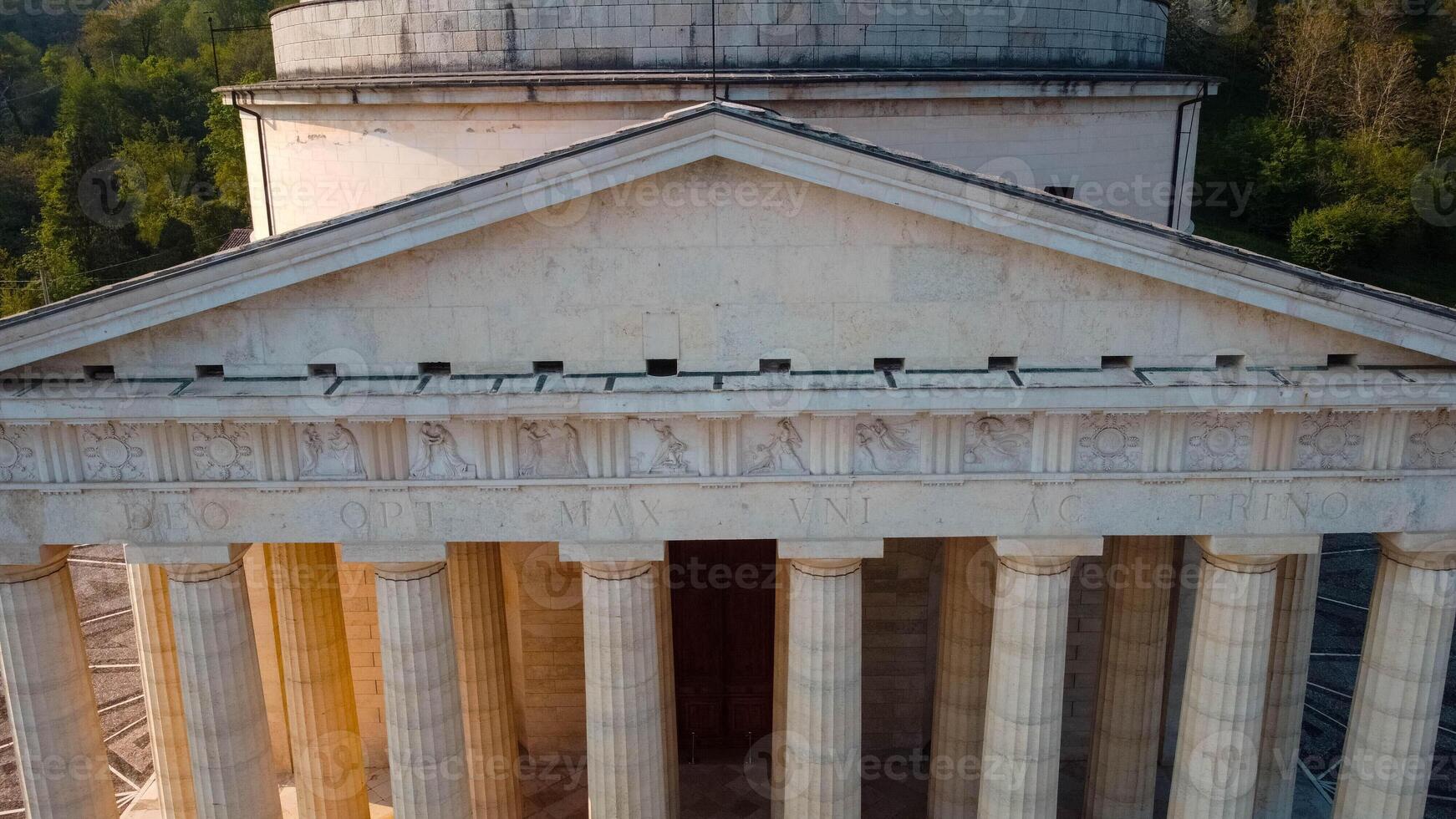 Possagno, VI, 2024, Architectural elements columns, frieze, pediment, of neoclassical temple. Canova temple of Possagno. Greek style architecture and colonnade. photo