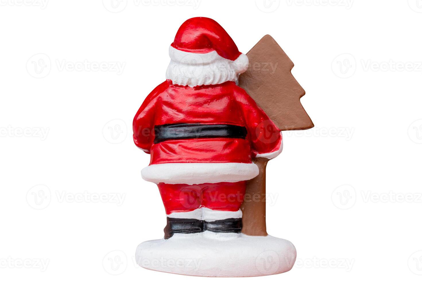 Miniature Santa Claus figurine dressed in a classic red suit isolated on a clean white background with a clipping path. Ideal for Christmas, holiday decorations, or festive-themed projects. photo