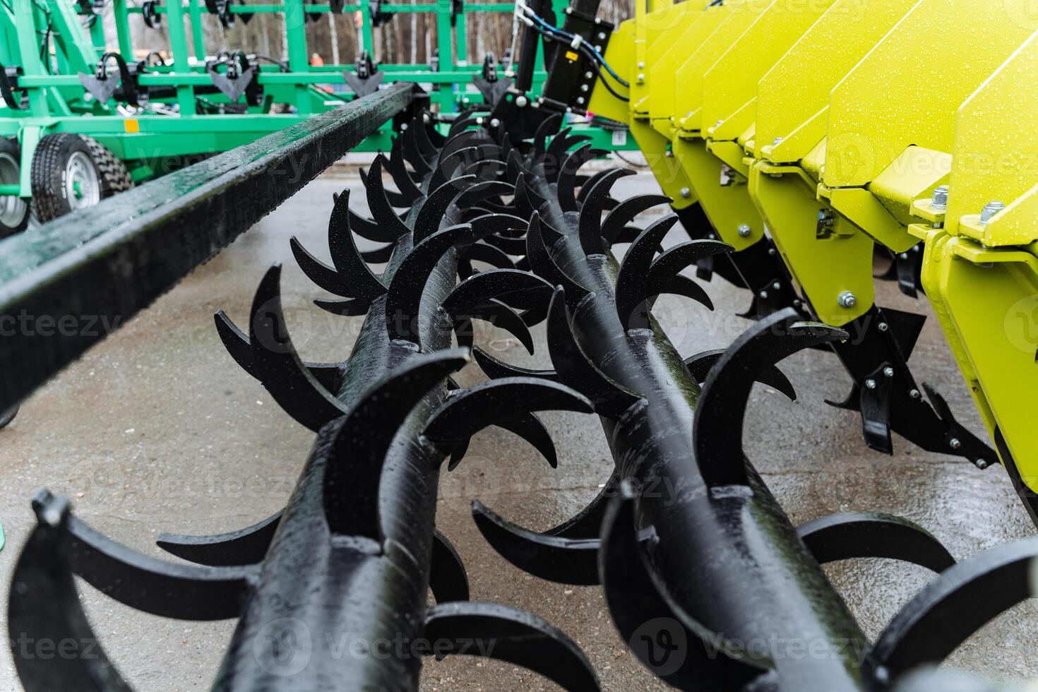 Close up of a machine with sharp blades, used for cutting various materials photo