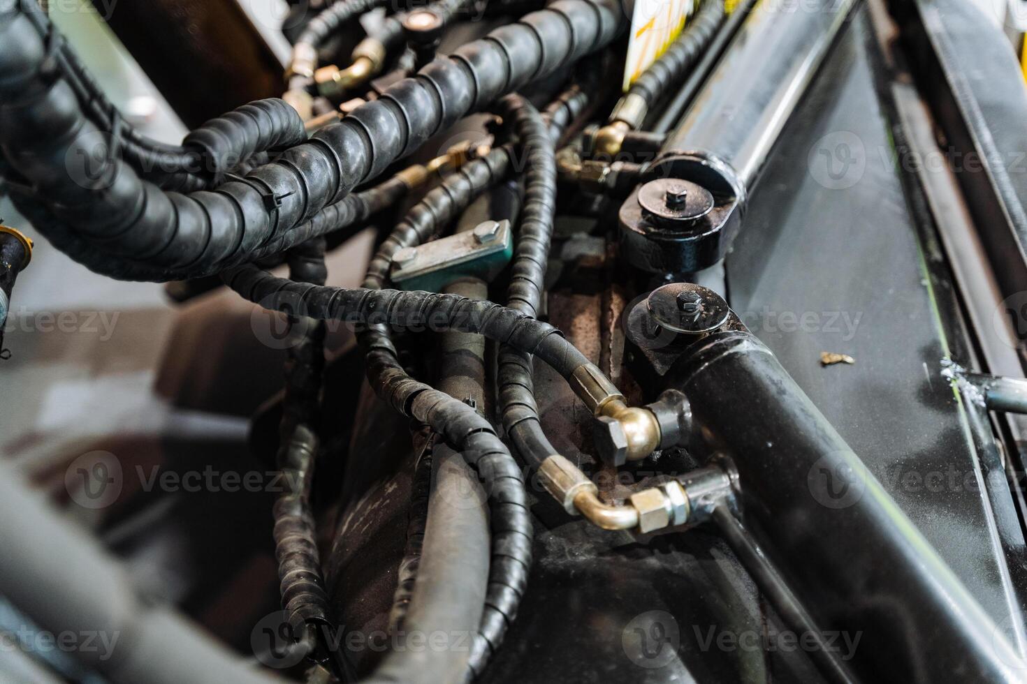 a close up of a hydraulic system on a vehicle photo