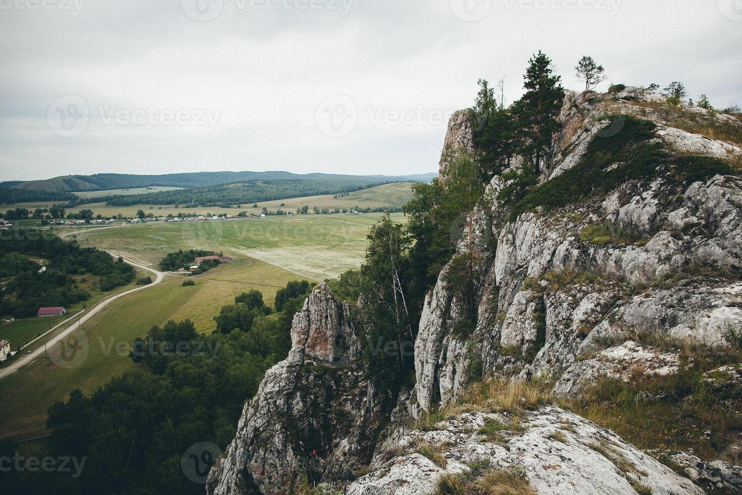 a view of a valley from the top of a mountain photo