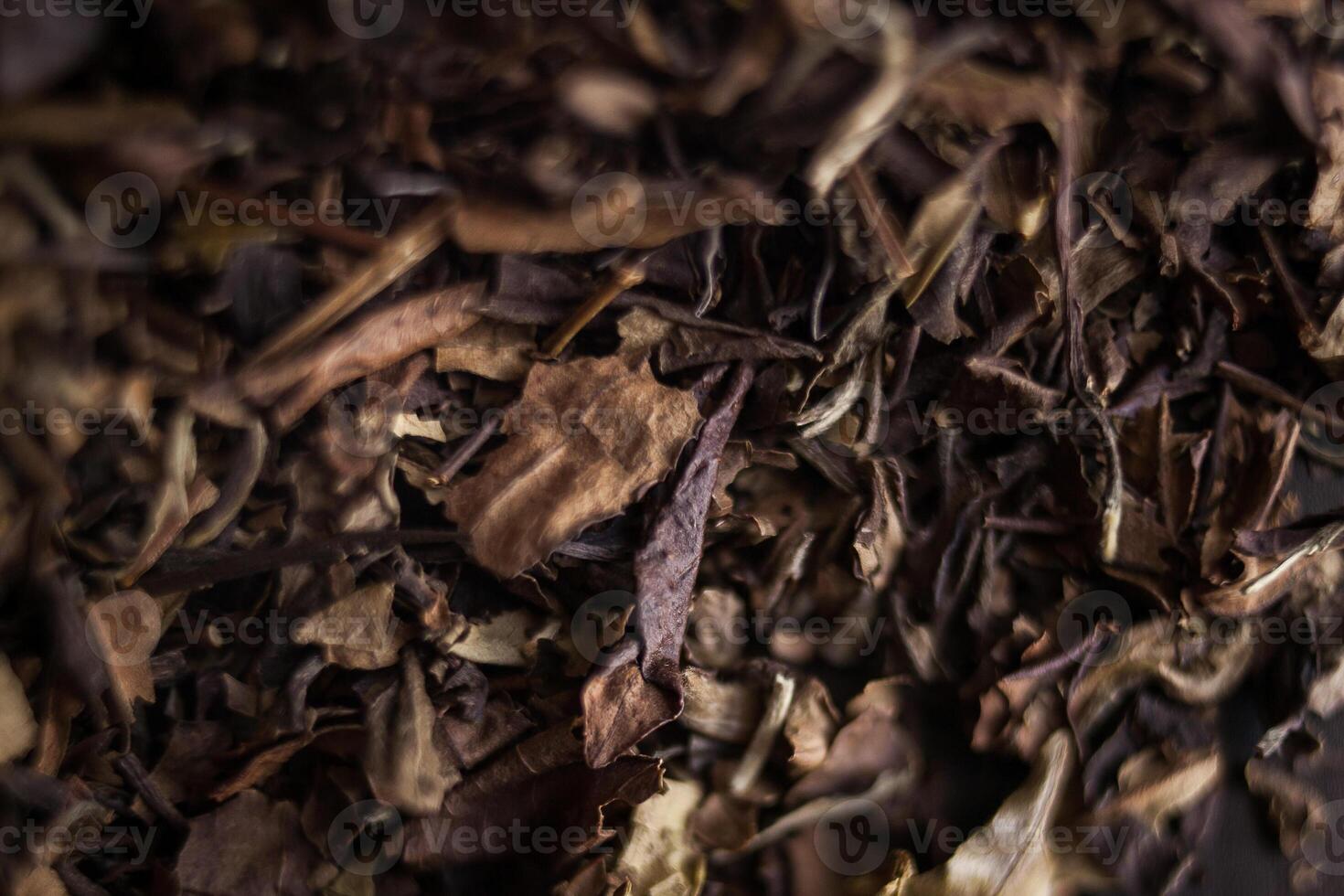 a close up of a pile of dried tea leaves photo