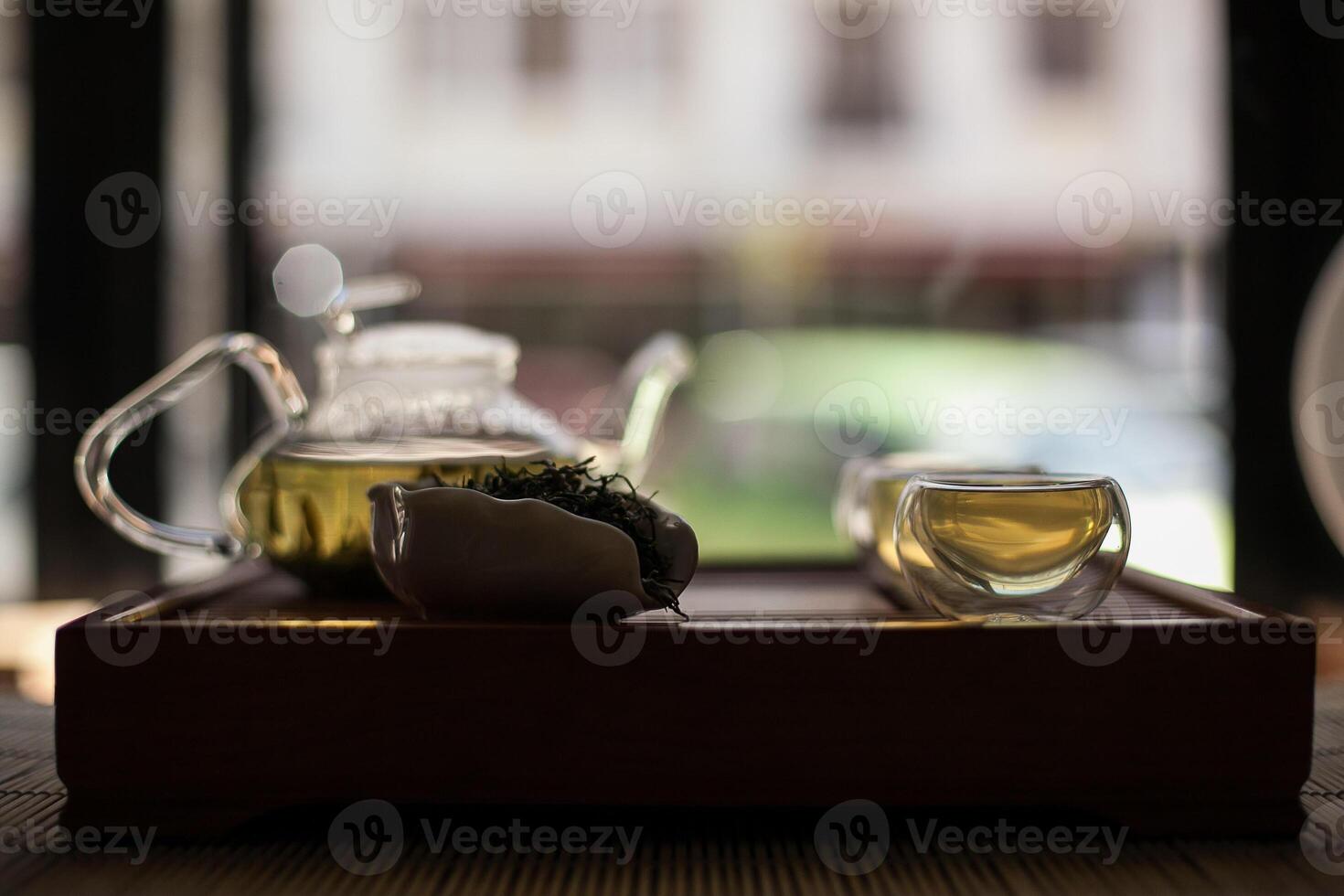 Serveware on wooden tray, tea set displayed in still life photography photo