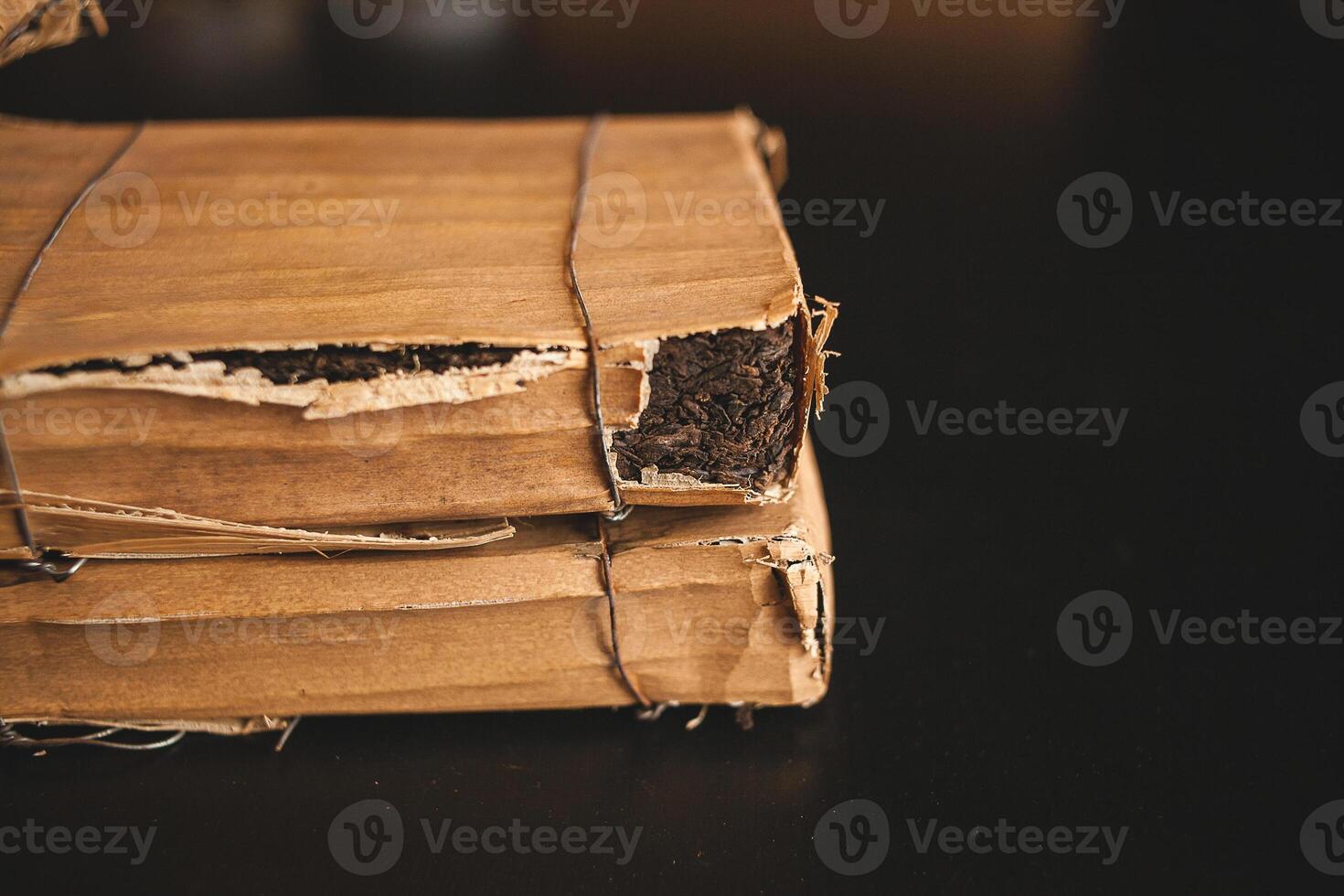 Stacked hardwood boxes tied with string, perfect for wood stain or varnish photo