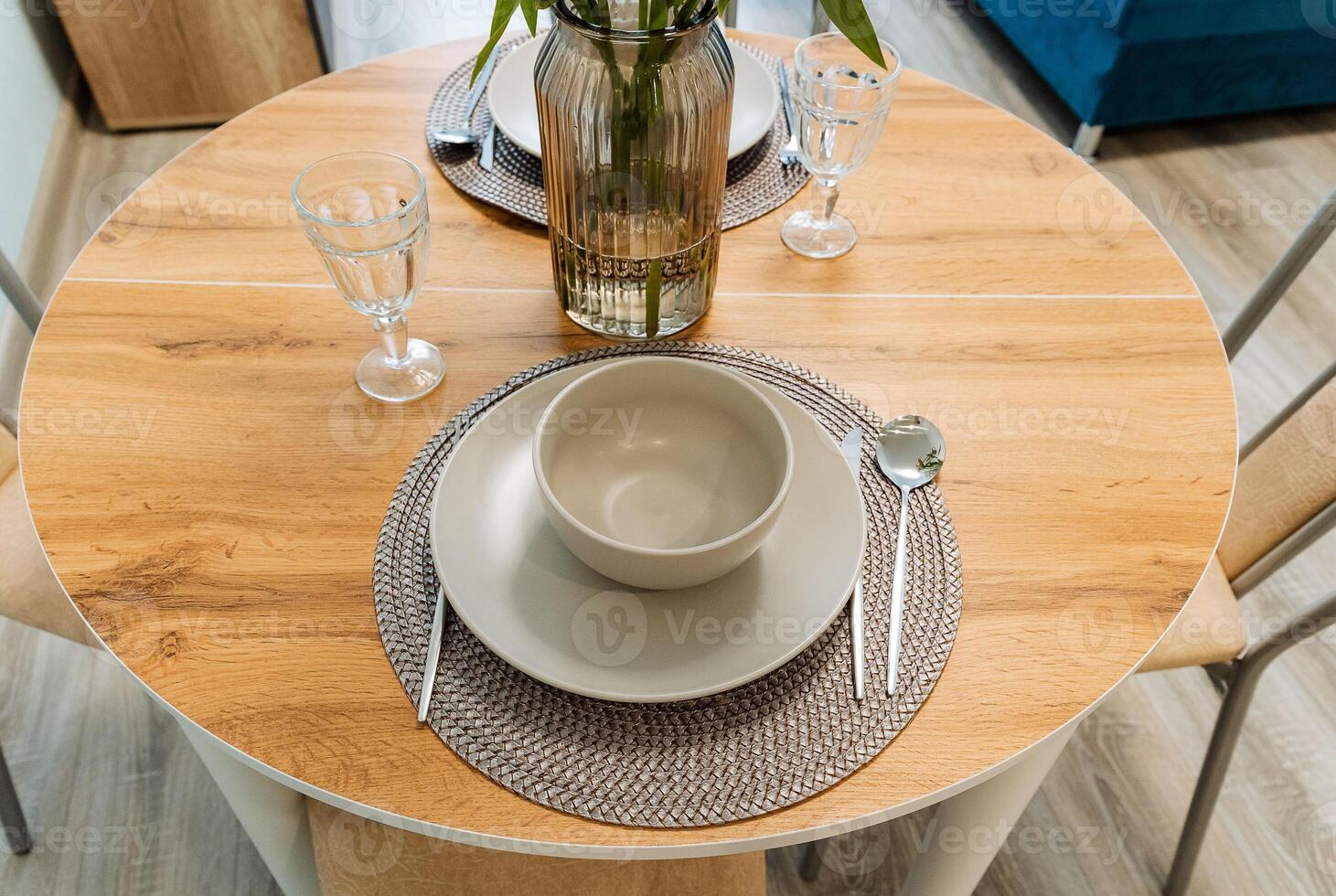 Stylish wooden tableware and decor set for your dining table photo