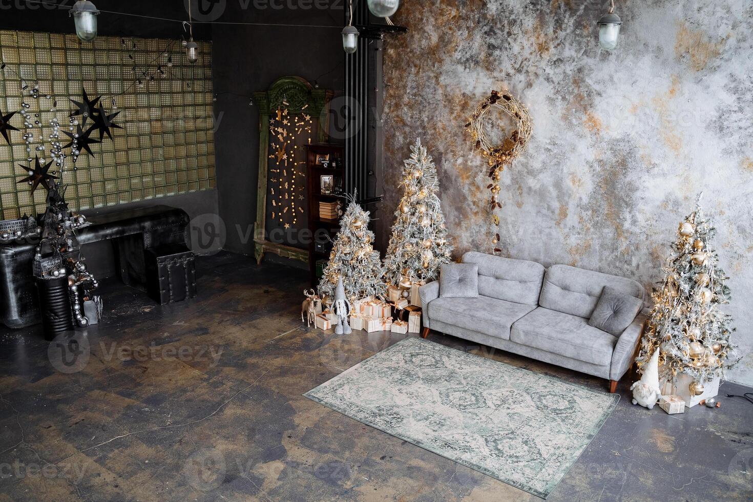 New Year's interior of the room. Decorated Christmas trees with gifts. tinsel and garlands.Interior shot . Christmas and New Year's mood photo