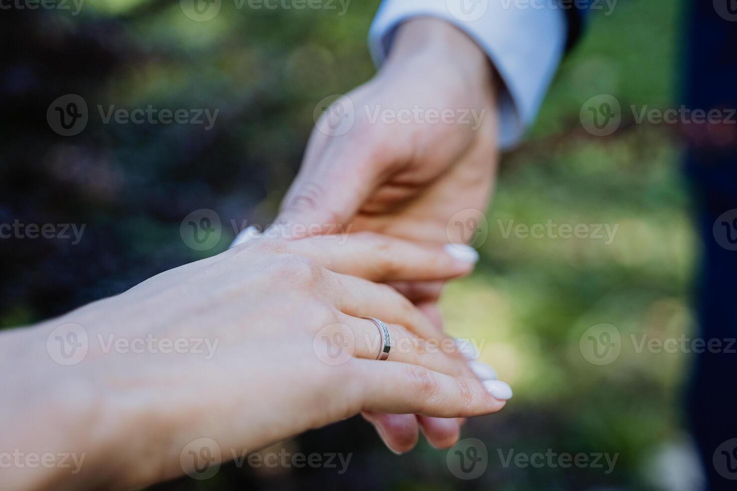 Close-up of a woman and a man holding out their hands, two people holding hands. The symbol is a sign of sincere feelings, a loved one. the concept of true friendship, outdoors photo