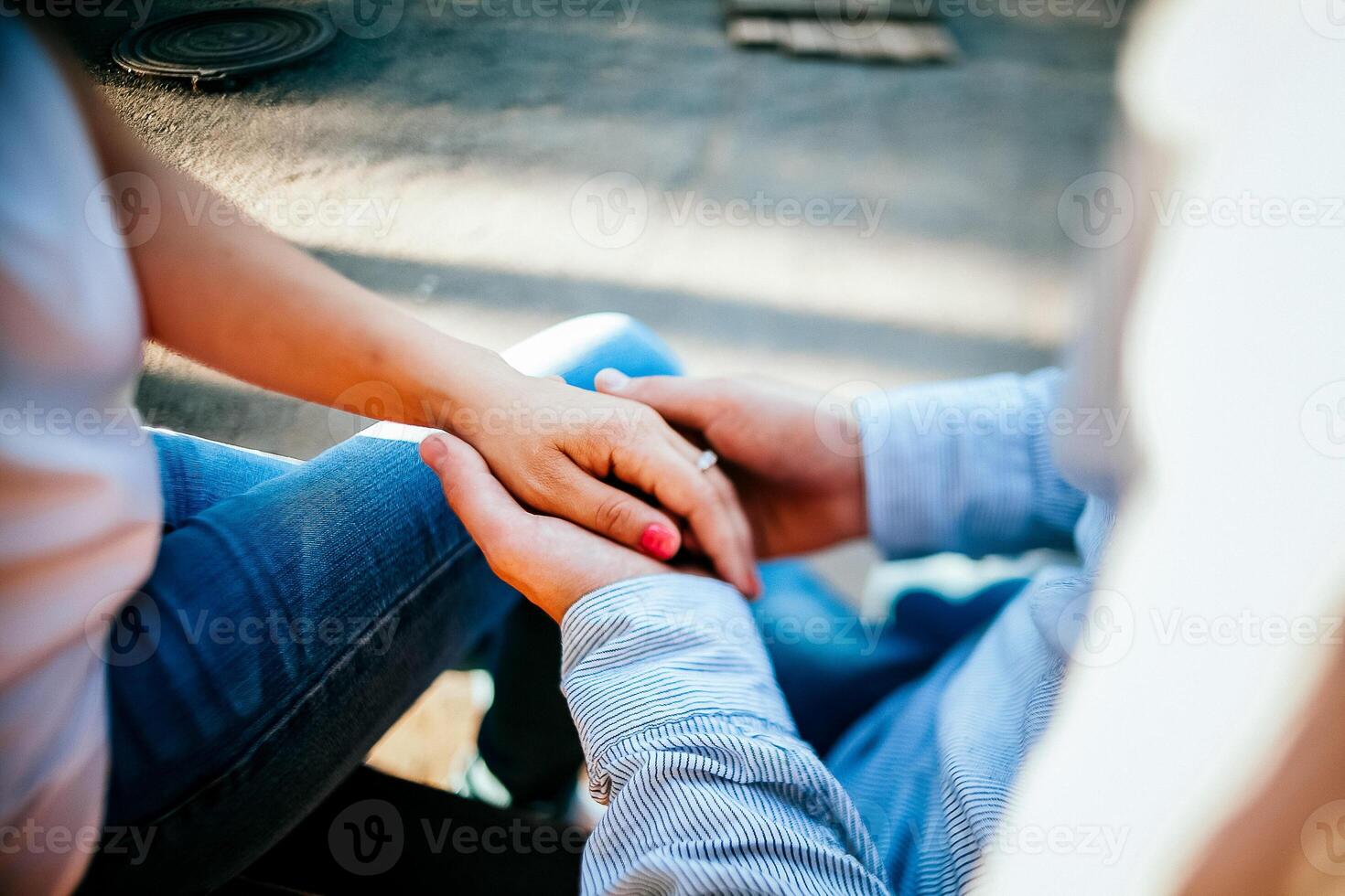 Close-up of a woman and a man holding out their hands, two people holding hands. The symbol is a sign of sincere feelings, a loved one. the concept of true friendship, outdoors photo